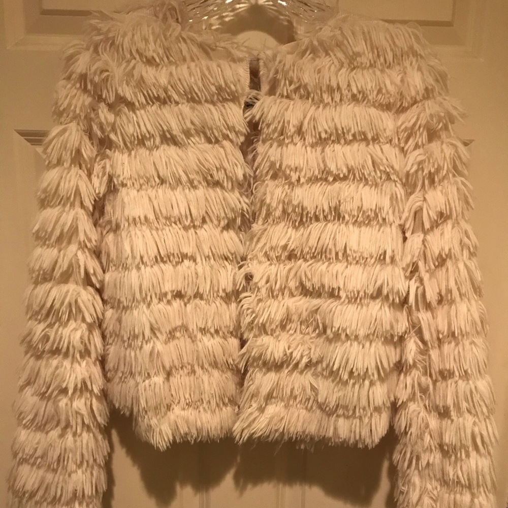 white faux fur coat